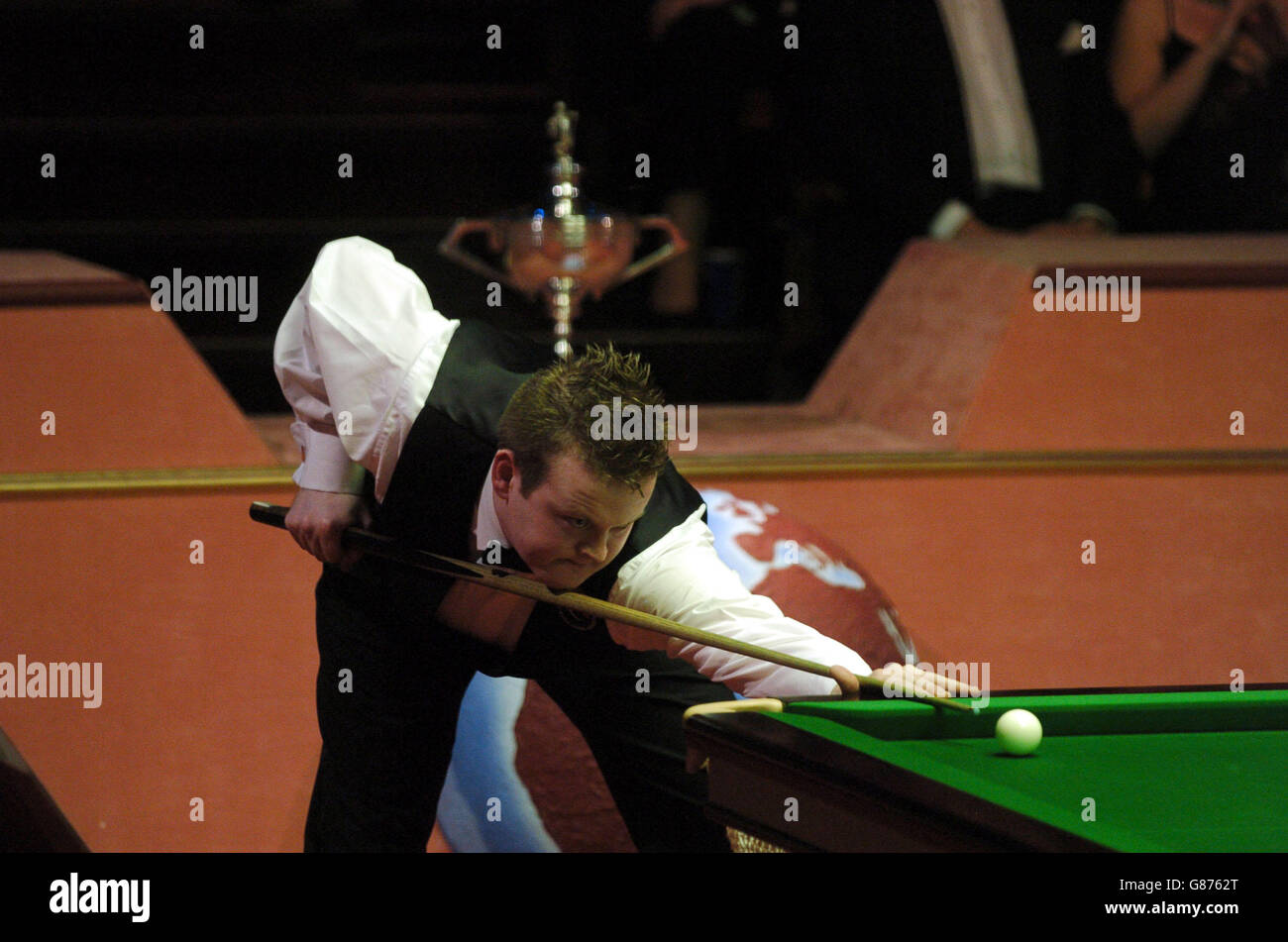 Shaun murphy concentrates on his shot hires stock photography and
