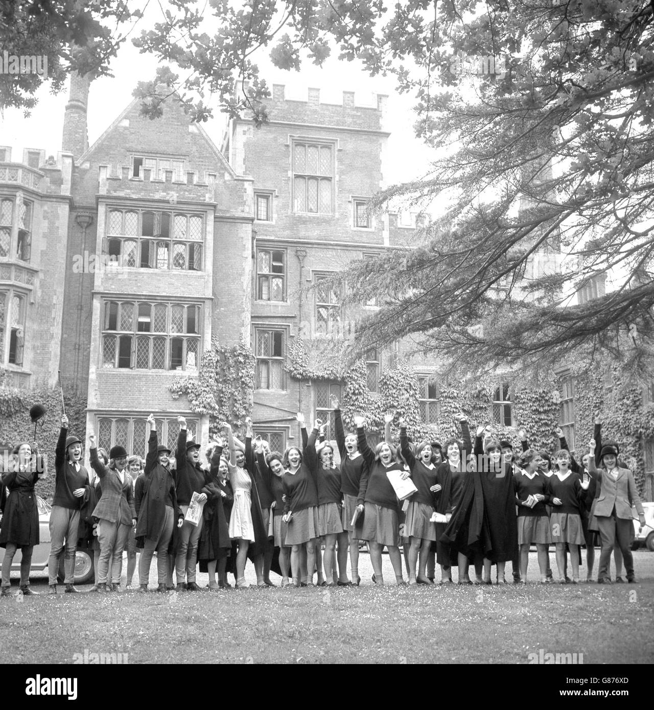 Girls of Benenden School, near Cranbrook, Kent, cheer the news that Princess Anne is to become a fellow pupil at the start of next term. Stock Photo