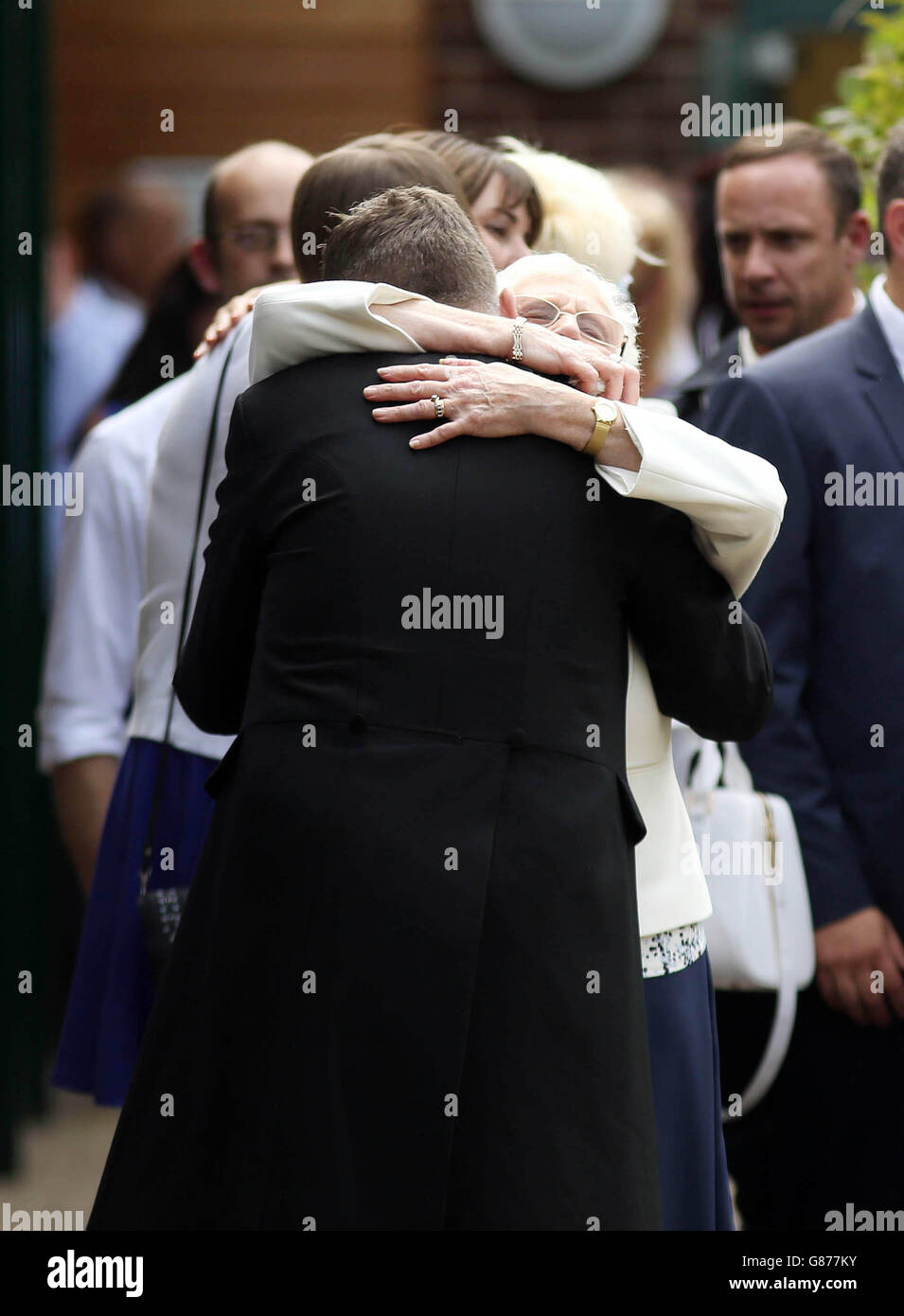 Is comforted after his funeral at worthing crematorium hires stock