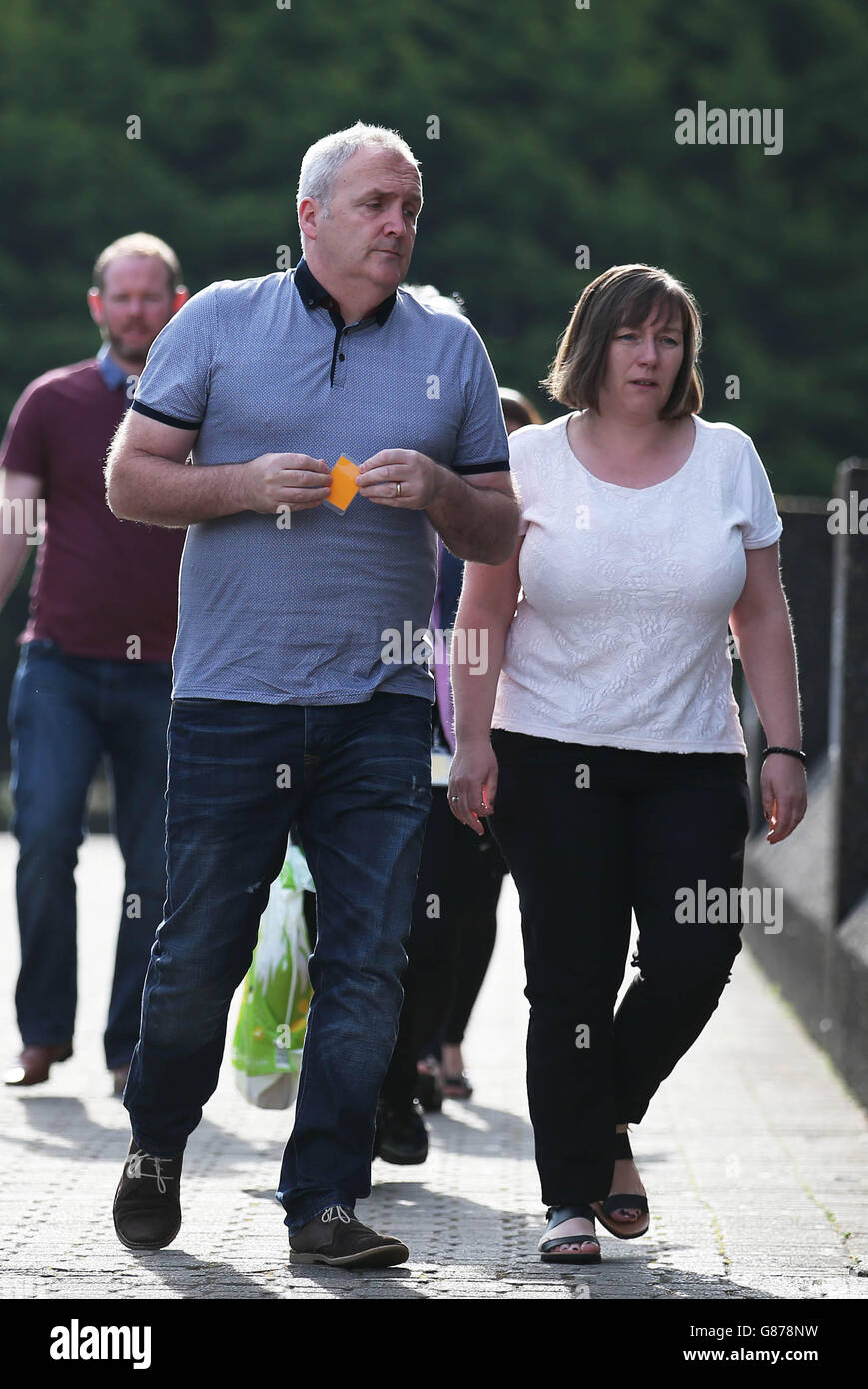 Jacqueline and Matthew McQuade, parents of Erin 18, who died along with her grandparents Jack Sweeney, 68, and his 69-year-old wife Lorraine in a bin lorry crash, arrive at Glasgow Sheriff Court for an inquiry into the crash which killed six people days before Christmas. Stock Photo
