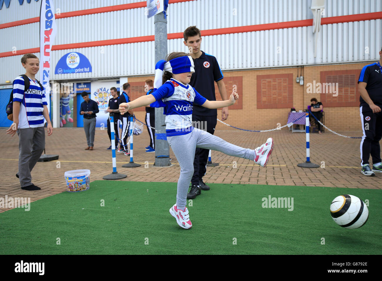 A young Reading fan takes a penalty kick blind folded in the Royals Fun