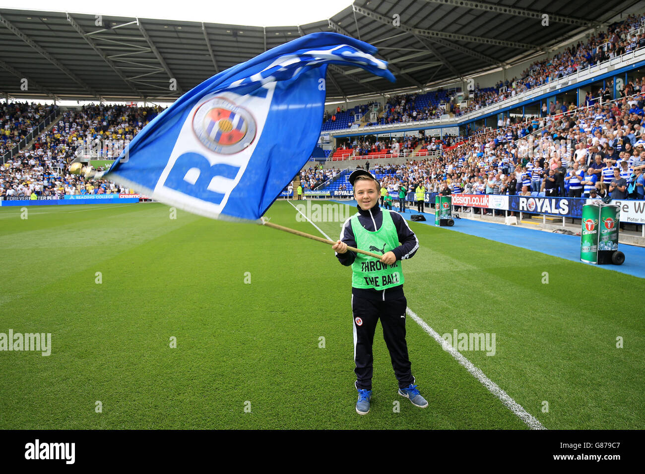 Reading flag bearer waves flag on the pitch kick off hires stock