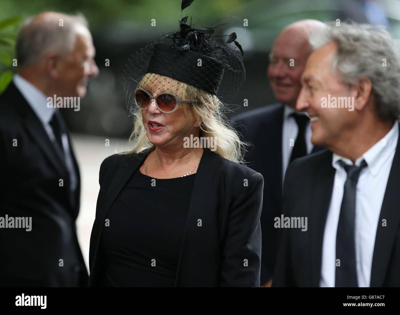 Pattie Boyd and Rod Weston arrive for the funeral of Cilla Black at St Mary's Church in Woolton, Liverpool. Stock Photo