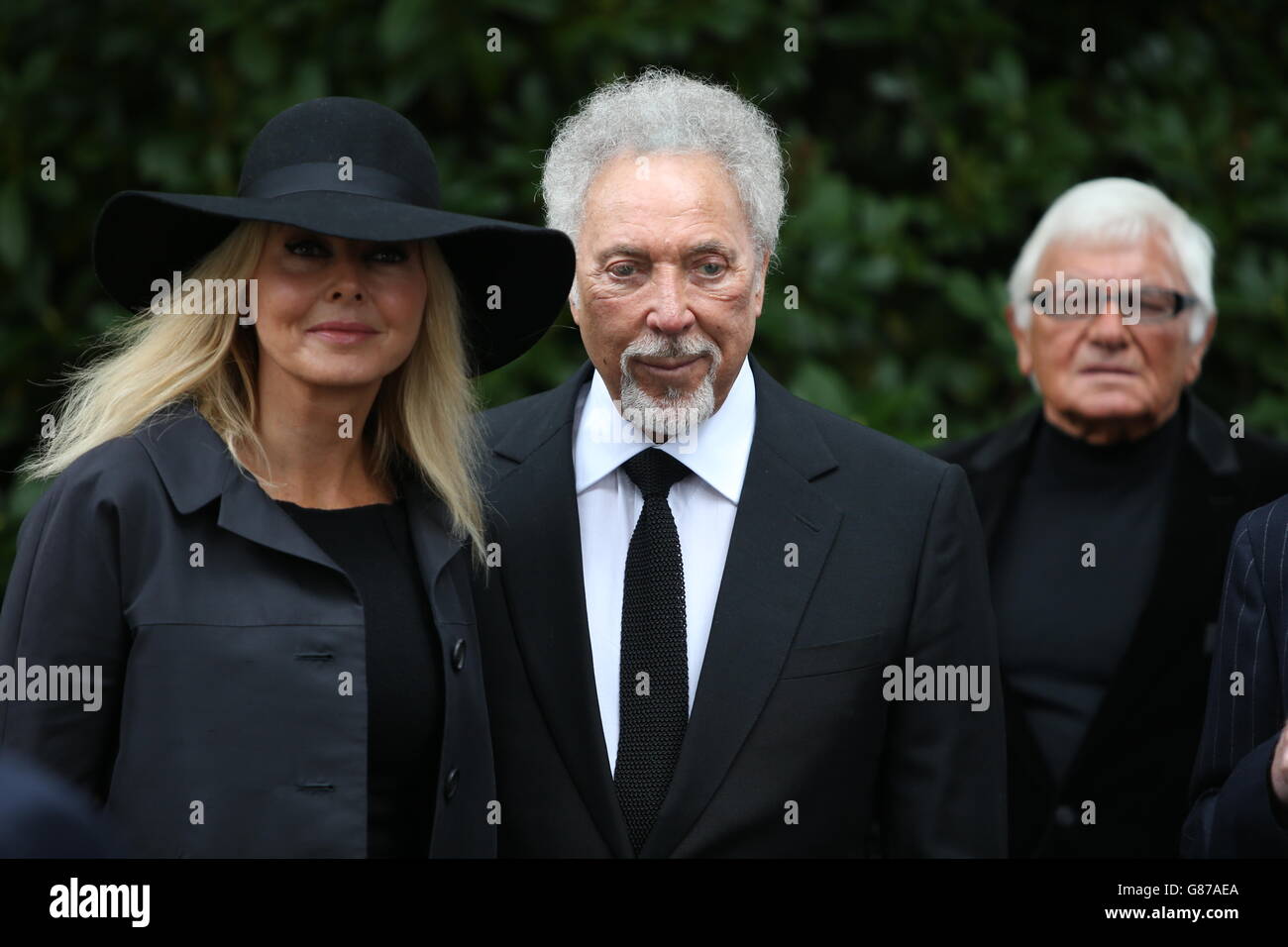 Carol Vorderman and Sir Tom Jones arrives for the funeral of Cilla