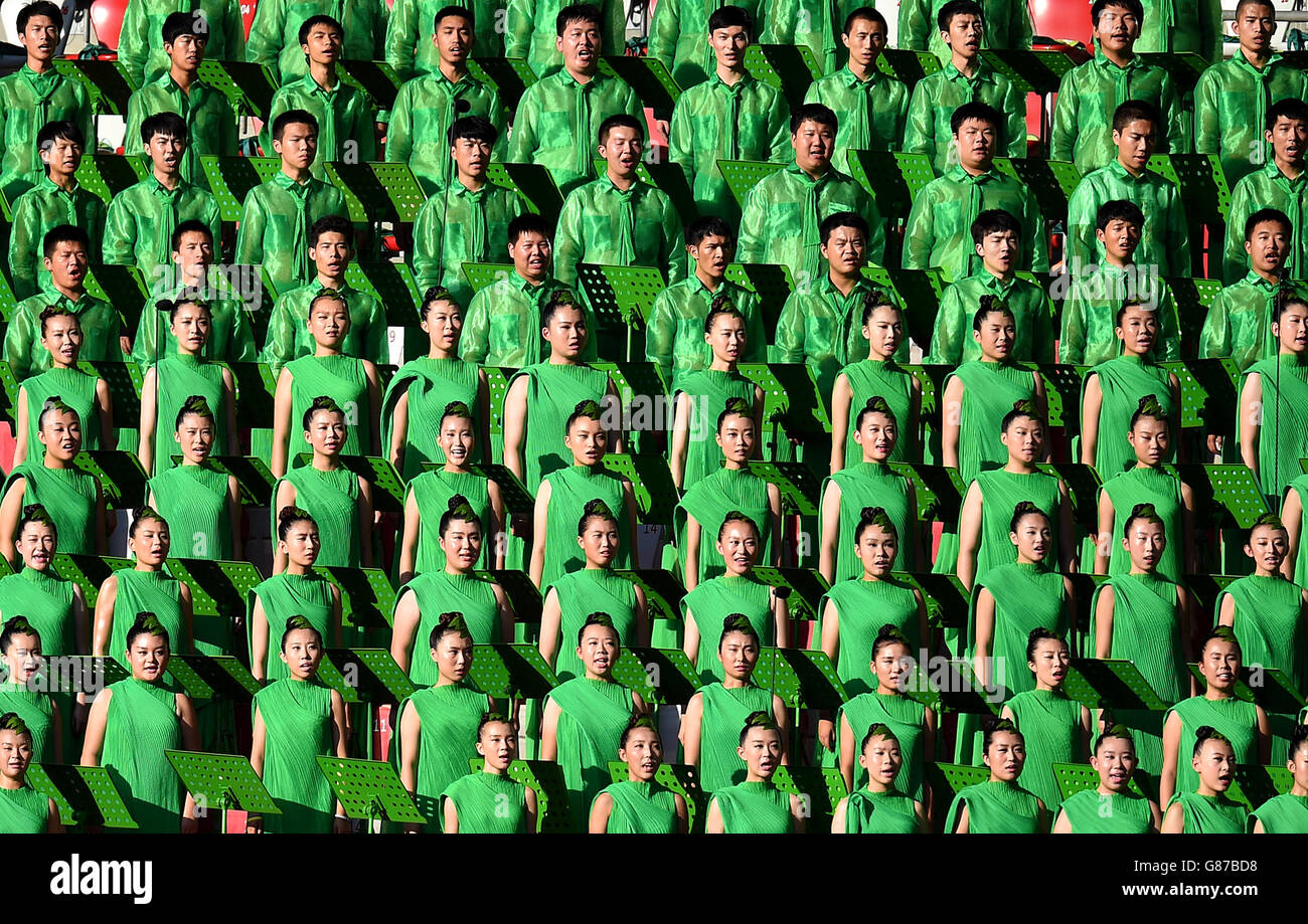 Performers sing during the opening ceremony during the IAAF World Championships at the Beijing National Stadium, China. Stock Photo