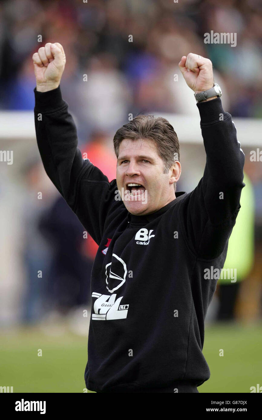 Scunthorpe United manager Brian Laws celebrates his teams promotion after the Coca-Cola League Two match against Shrewsbury Town. Stock Photo