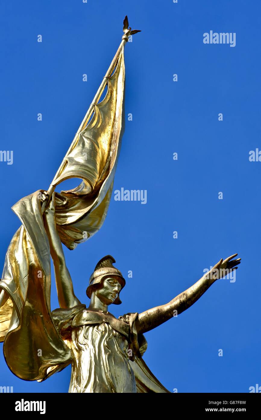 A beautiful gold statue on top of a memorial in DC Stock Photo Alamy