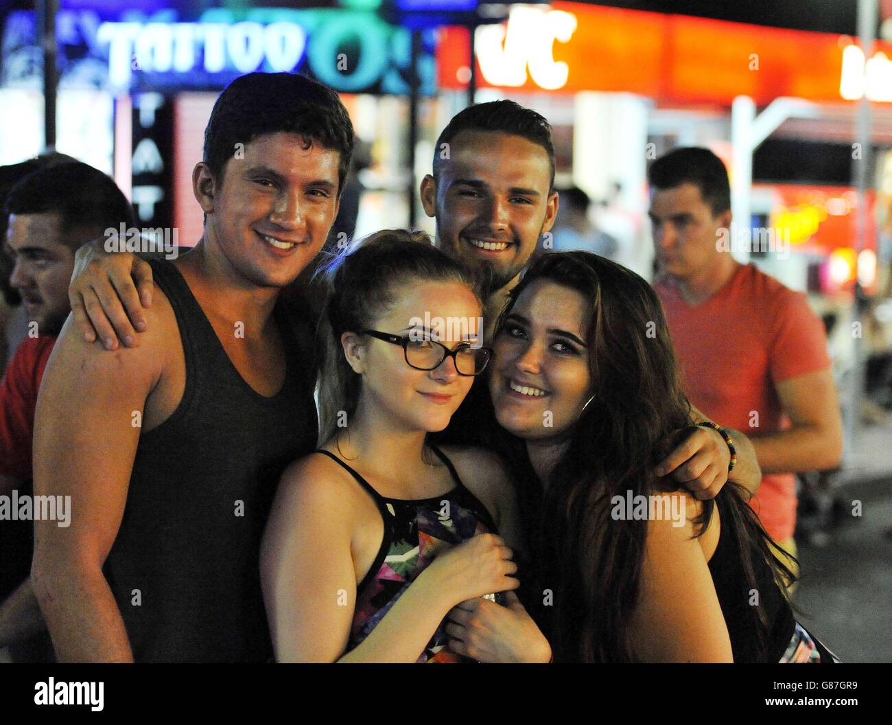 Tourists Talitha Thornton (centre) and Christianna Tate, both 18 and from  Sheffield, with Dan Pearson (left) and Charlie Endean, both 19 and from  Surrey, in Punta Ballena, the main club strip in