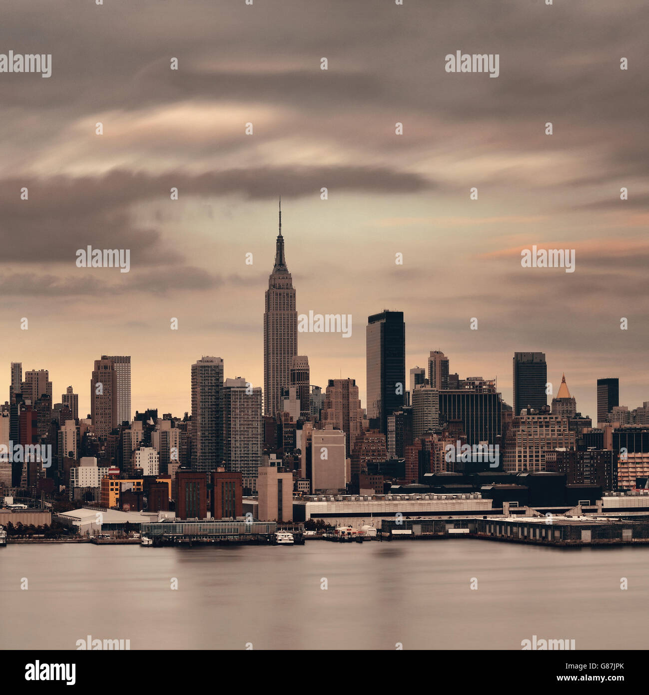 Manhattan midtown skyscrapers and New York City skyline at sunset Stock ...