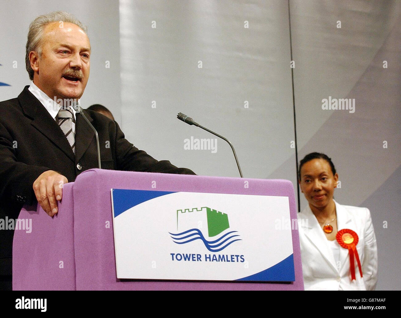 Former Labour MP George Galloway speaks after being elected as MP for the Bethnal Green & Bow constituency at the East Winter Gardens, London. Galloway, standing as a Respect party candidate, beat previous Labour MP Oona King (right) for the seat which had been held by Labour since 1945. Stock Photo