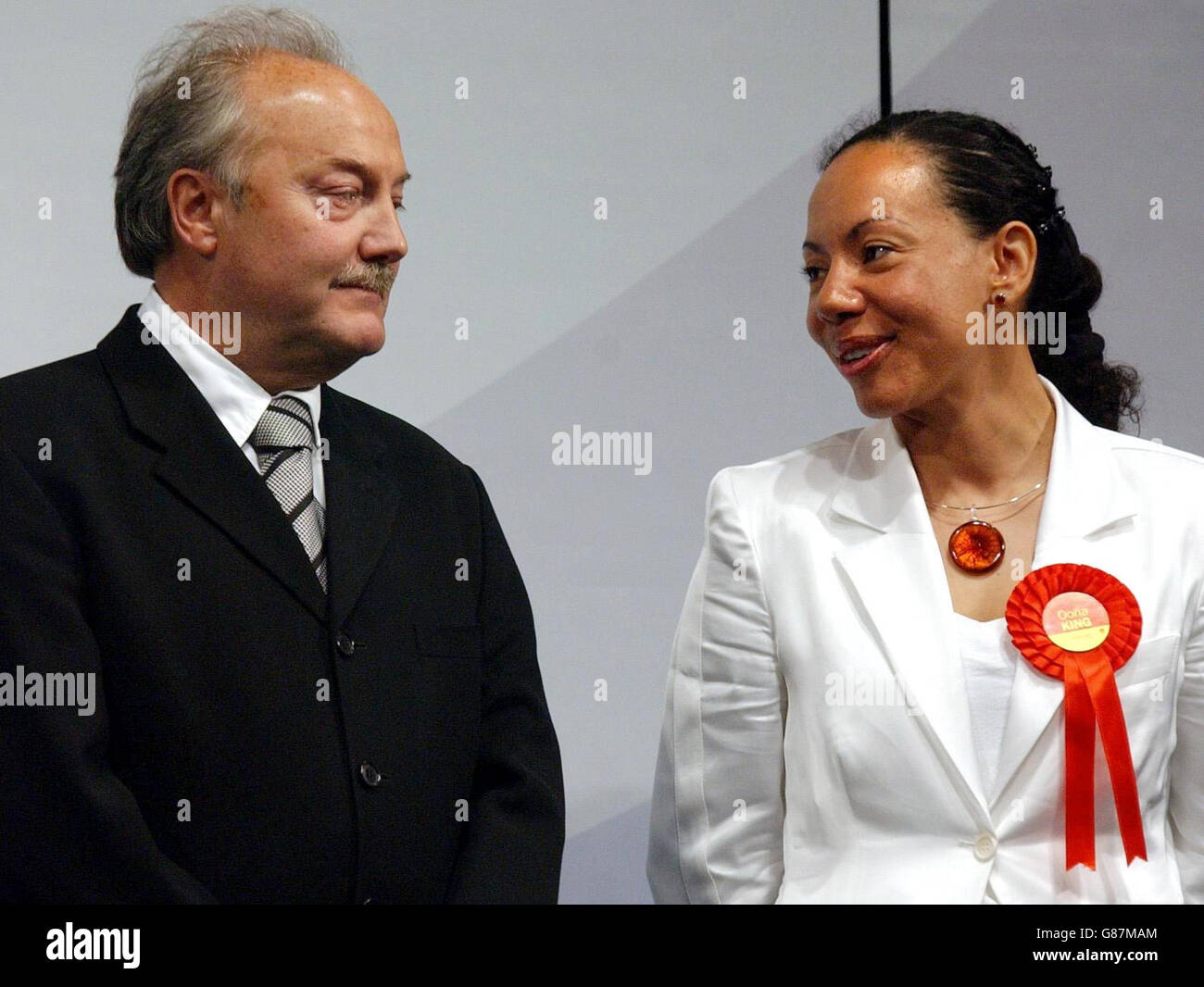 Former Labour MP and new Respect party MP George Galloway is congratulated by Labour MP Oona King (right) after winning the Bethnal Green & Bow constituency at the East Winter Gardens. Galloway, standing as a Respect party candidate, beat previous Labour MP Oona King for the seat which had been held by Labour since 1945. Stock Photo
