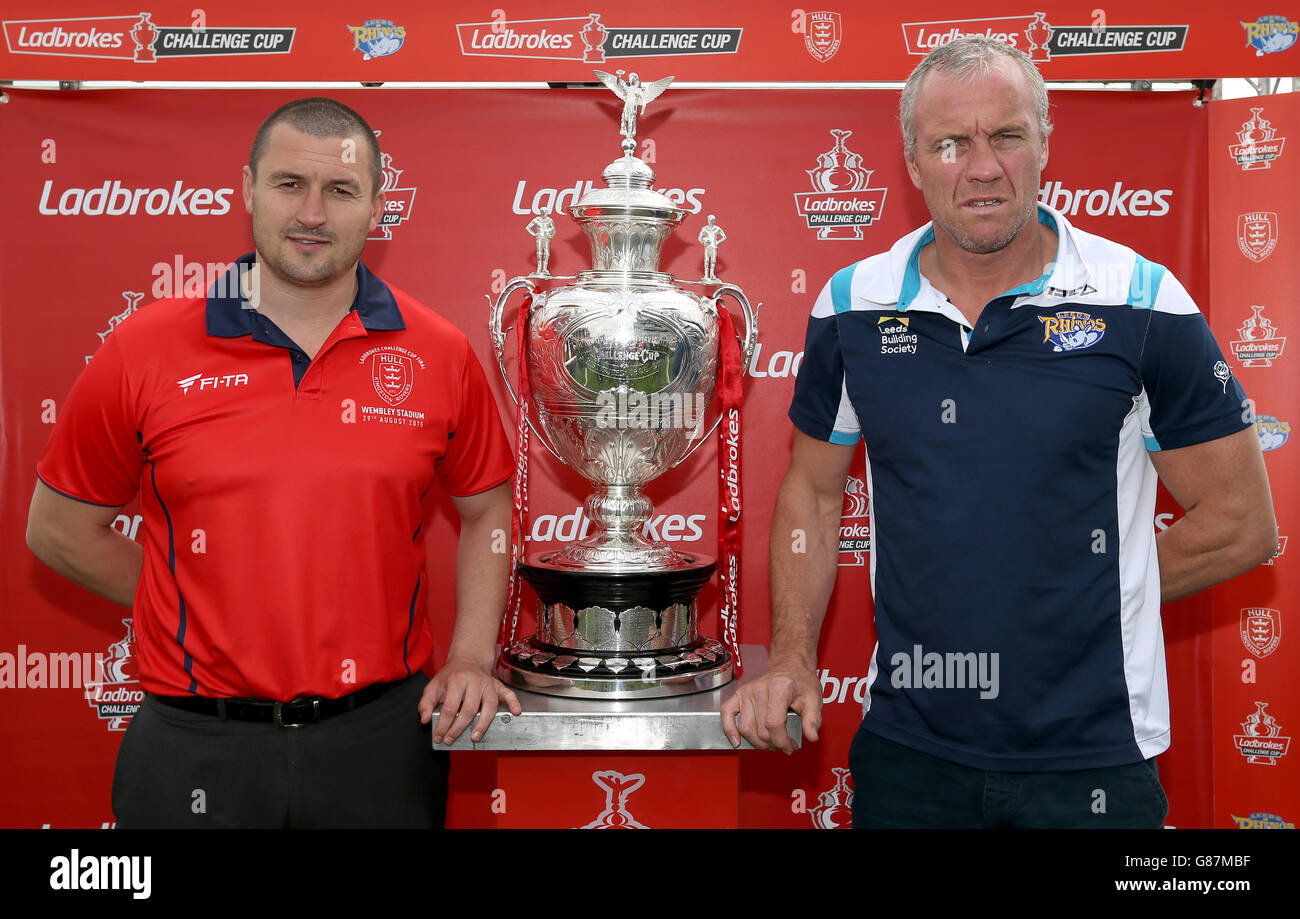 Hull KR head coach Chris Chester (left) and Leeds Rhinos head coach Brian McDermott pose for a photograph with the Rugby League Ladbrokes Challenge Cup trophy during the joint press conference ahead of the Challenge Cup Final, at Doncaster Racecourse. Stock Photo