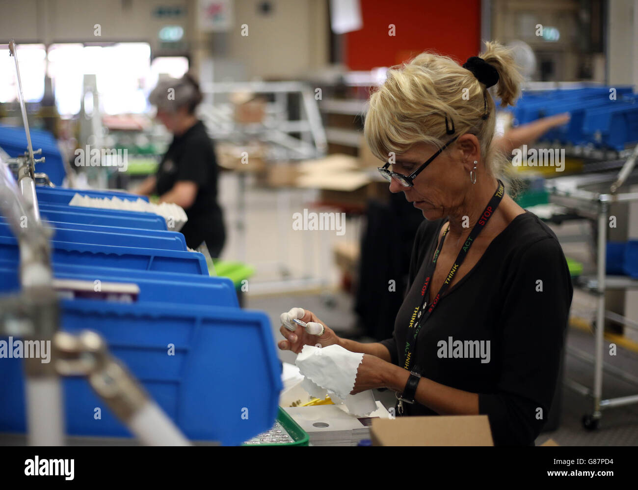 18/8/2015 staff at the Royal Mint in Wales working on a commemorative