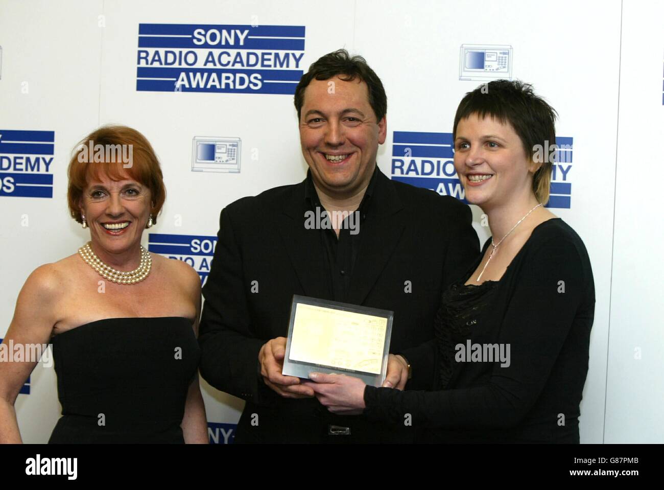 Esther Rantzen, left, stands with representatives of the winner of the 'Interactive Radio Award', Three Counties Breakfast, BBC Three Counties Radio which she presented. Stock Photo