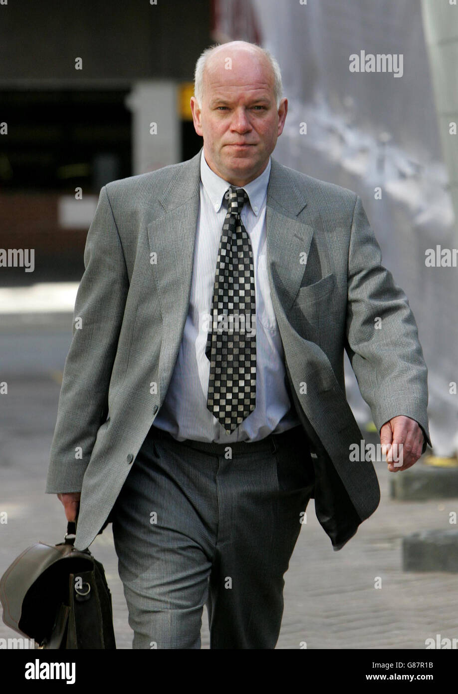 Ian Burke, the Head of Art at Eton College arrives at an employment tribunal hearing where former teacher Sarah Forsyth is appealing against her alleged unfair sacking from the prestigous school. Yesterday, Ms Forsyth claimed in a statement that parts of a painting featured in newspapers as Prince Harry's A-Level work had been completed by Mr Burke. Stock Photo