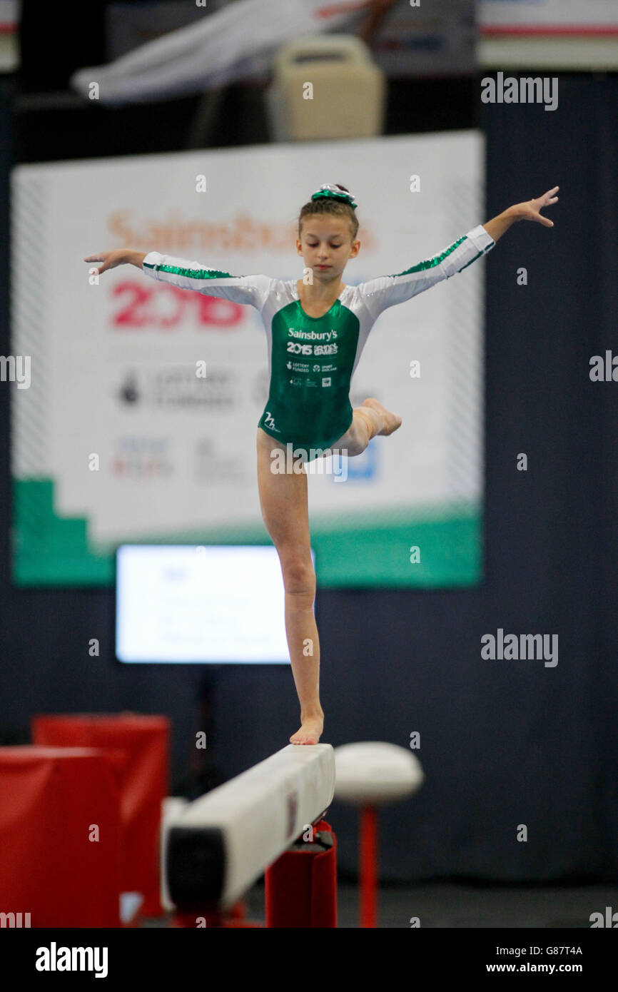 Northern Ireland's Rebecca Geddis on the beam during the Sainsbury's 2015 School Games in Manchester. Stock Photo