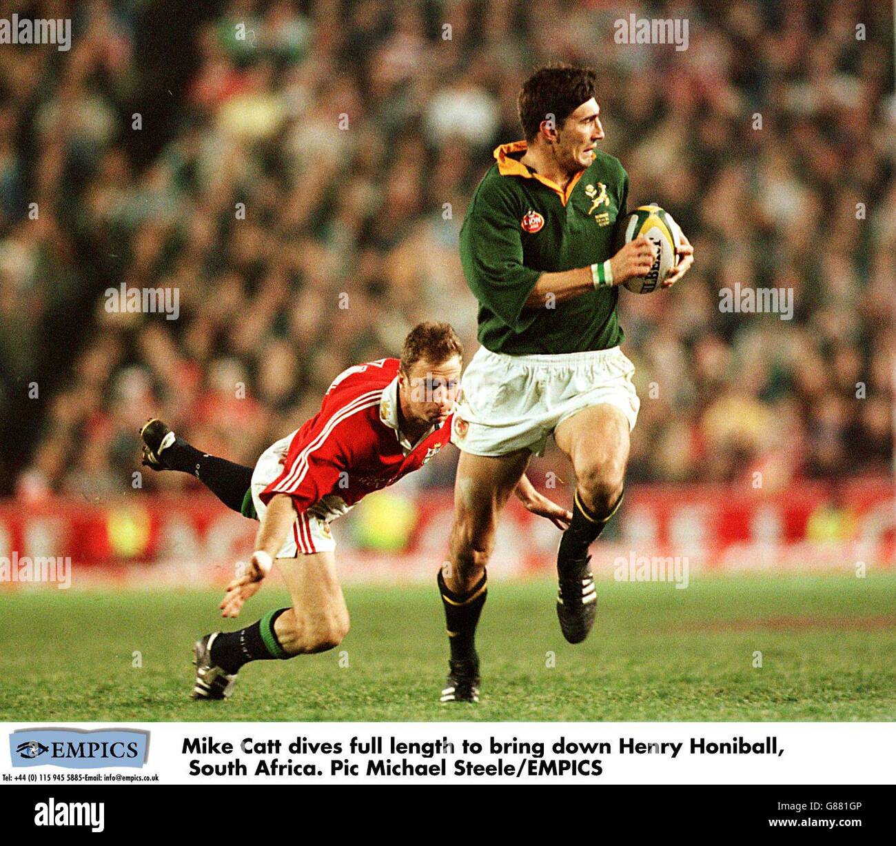 Rugby Union ...British Lions Tour to South Africa ...South Africa v British Lions, third test, Johannesburg. Mike Catt dives full length to bring down Henry Honiball, South Africa. Stock Photo