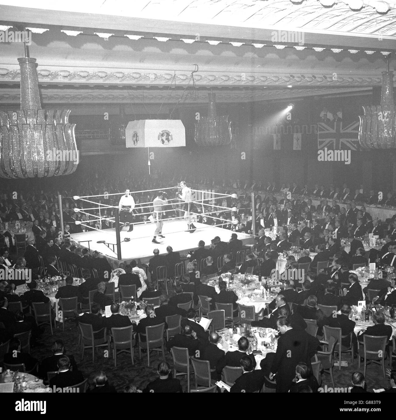 A heavyweight bout between Derek Groombridge and Pat Roach takes place on the opening night of the World Sporting Club at Grosvenor House, Park Lane. Stock Photo