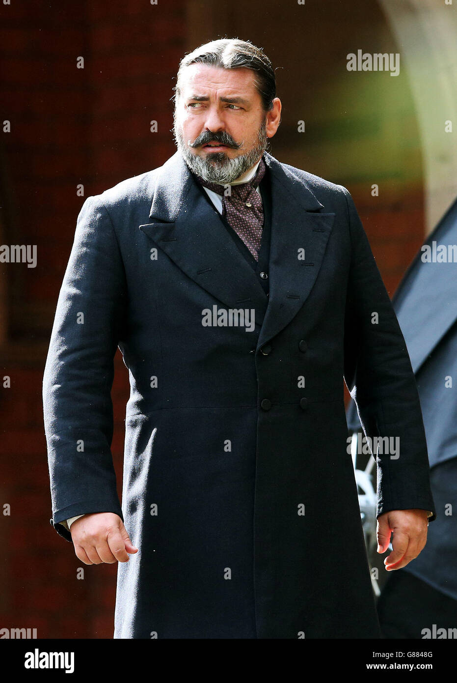 Angus MacFadyen outside Methodist College during the filming of Lost City Of Z in Belfast. Stock Photo