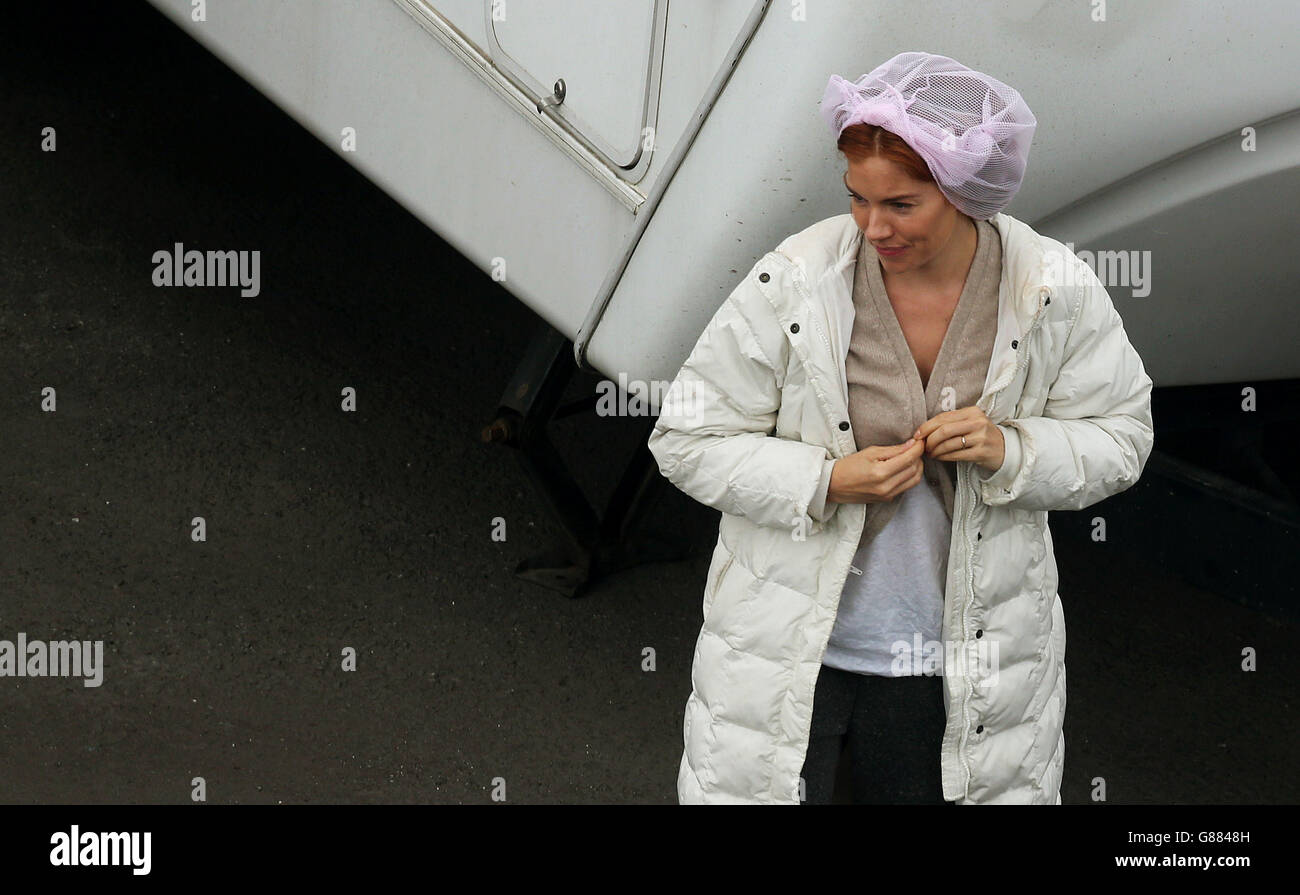 Sienna Miller during the filming of Lost City Of Z in Belfast city centre. Stock Photo