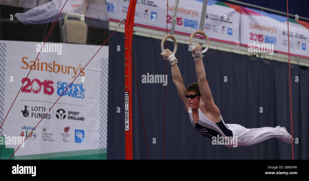 Scotland's Joshua Lincoln on the Rings in the Gymnastic during the Sainsbury's 2015 School Games in Manchester. Stock Photo