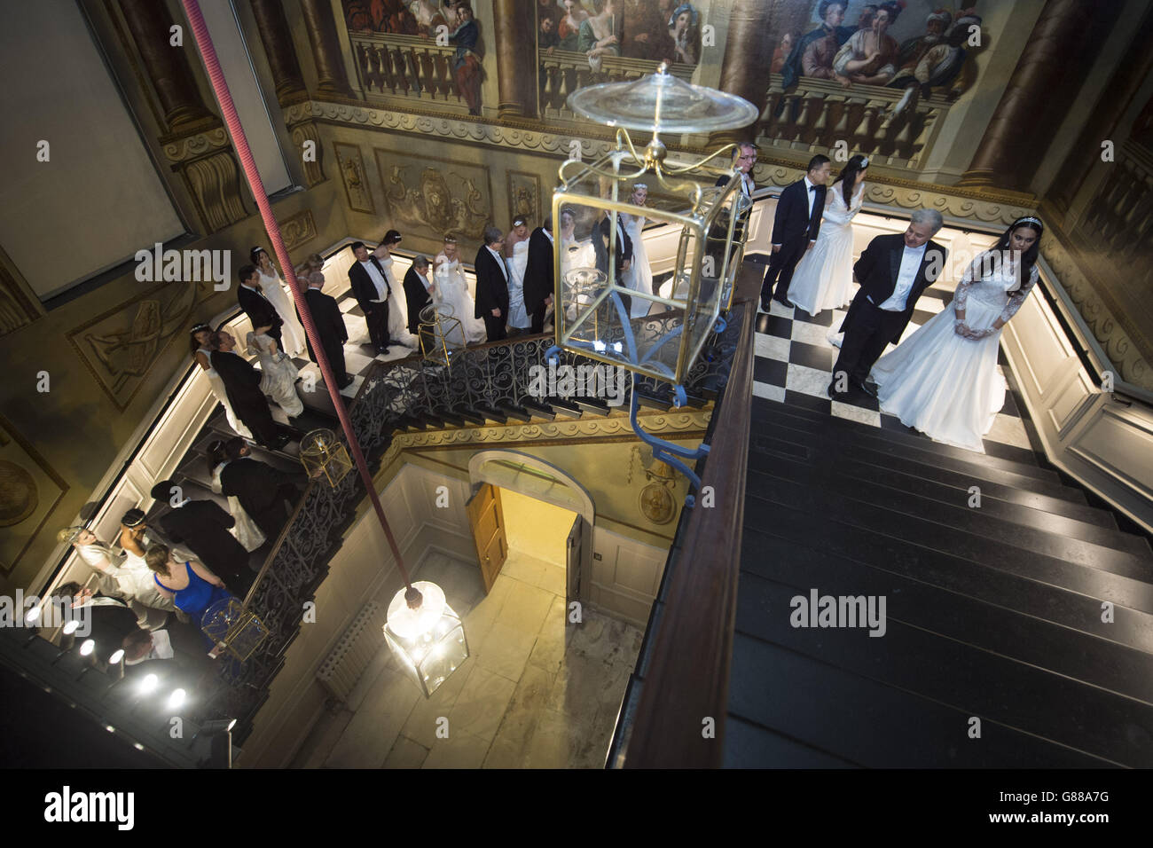 Debutantes queue on the King's Staircase at the Queen Charlotte's Ball ...
