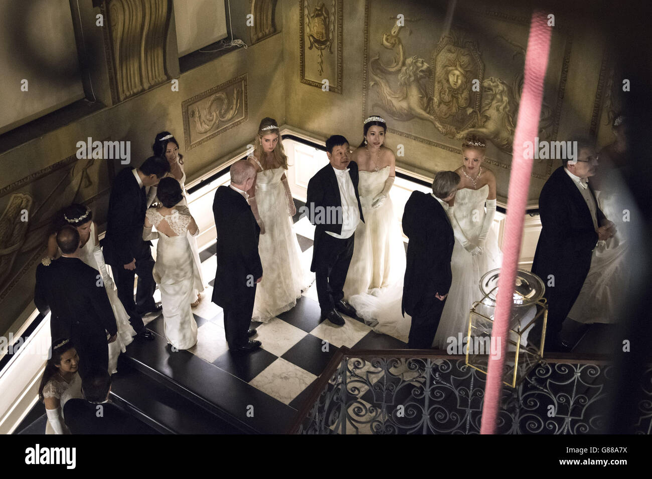 Debutantes queue on the King's Staircase at the Queen Charlotte's Ball ...