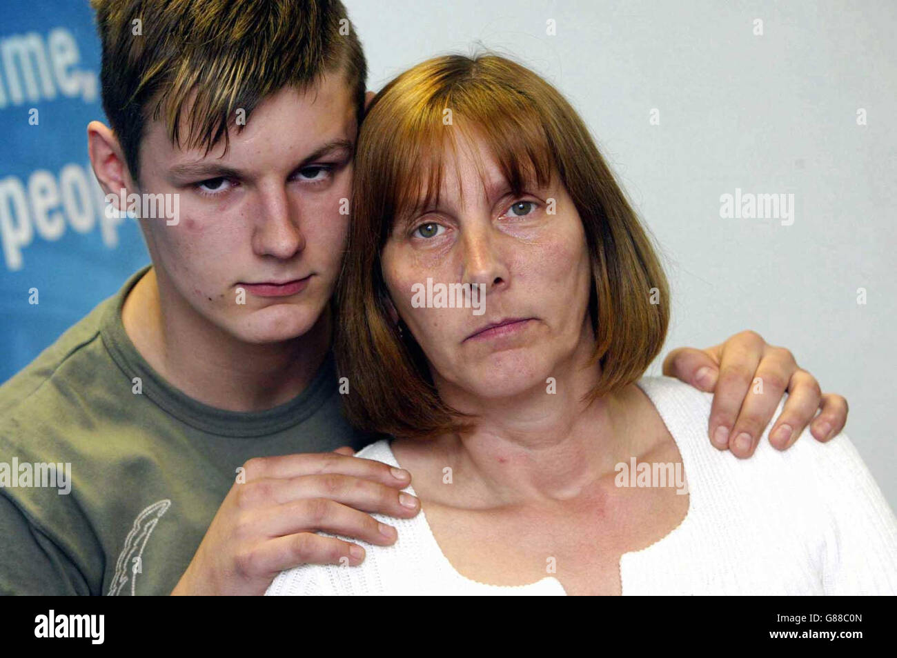 Jean Carroll, 44 , and son Alan, 17, make an appeal at Hope Hospital, for help to find the attackers of her husband Phil Carroll. The 48-year-old father-of-four suffered serious head injuries after confronting teenagers who threw a stone at his Range Rover in Salford. Stock Photo