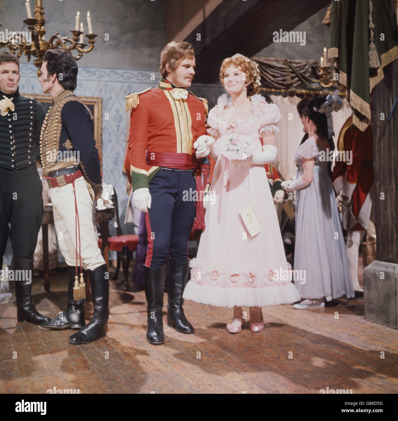 Actress Susan Hampshire (Becky Sharp), Dyson Lovell (Rawdon Crawley), at the Duchess of Richmond ball on the eve of Waterloo, one of the scenes from 'Vanity Fair', a BBC 2 production which will be shown in full colour. The scenes are being filmed at Ealing Studios, London. Stock Photo