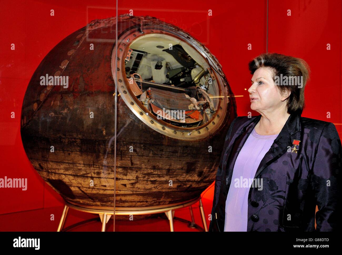 Valentina Tereshkova, the first woman in space, stands in front of Vostok-6, the capsule that she piloted into space, during the press preview of the Science Museum in London's new Cosmonauts: Birth of the Space Age exhibition. Stock Photo