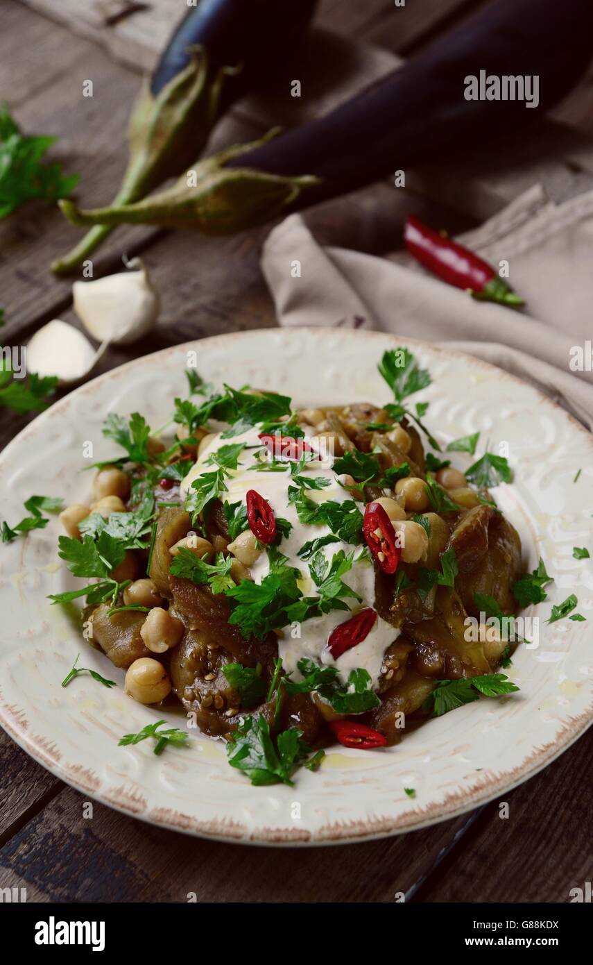 Moroccan roasted aubergine and chickpea salad with spicy yoghurt