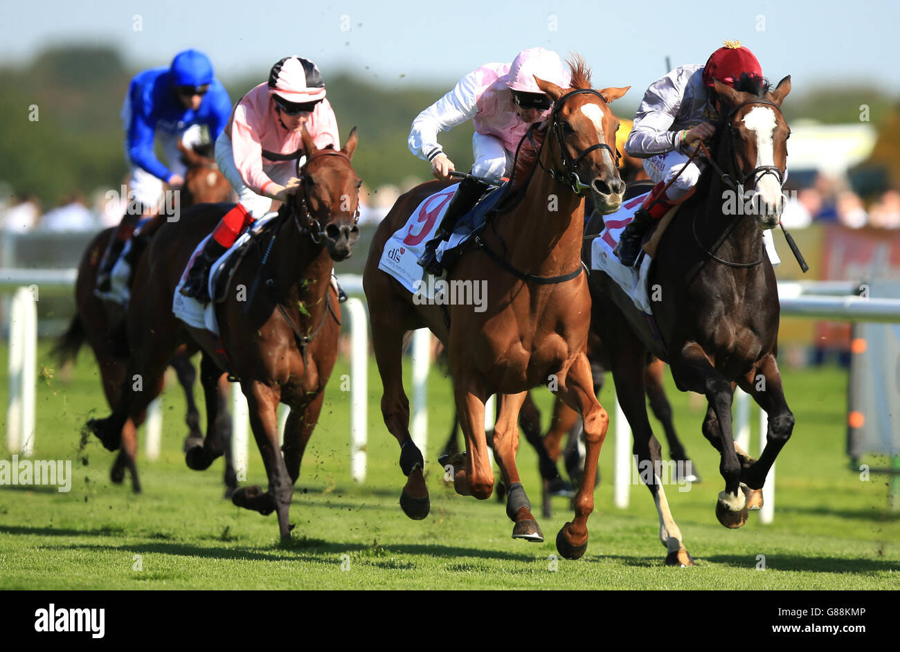 Gretchen ridden by Robert Havlin (pink, white sleeves) wins the DFS Park Hill Stakes during day two of the 2015 Ladbrokes St Leger Festival at Doncaster Racecourse, Doncaster. Stock Photo