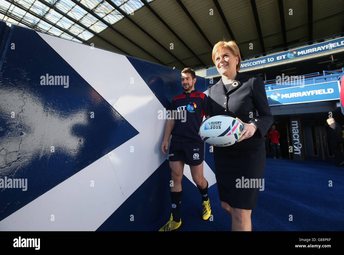 First Minister Nicola Sturgeon Walks From The Tunnel With Captain Greig Laidlaw Left As She Meets The Scotland Rugby World Cup Squad At Murrayfield Stadium Ahead Of The World Cup Stock Photo