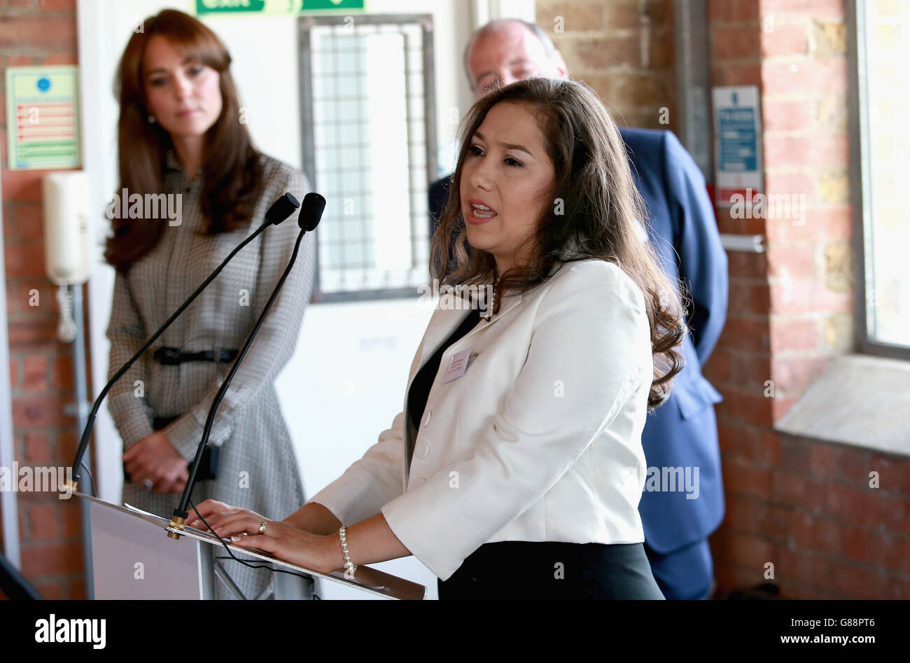 The Duchess of Cambridge listens to a speech by Andrea Noguera of the parents panel during a tour of the Anna Freud Centre in London, which is her first solo public engagement since the birth of her daughter Princess Charlotte in May. Stock Photo