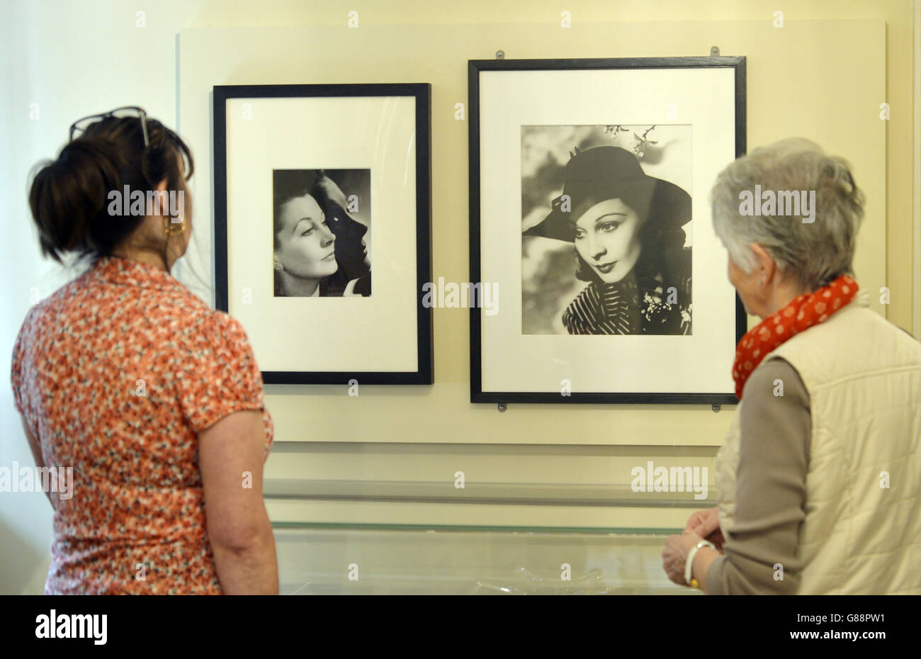People take a look at some photos of actress Vivien Leigh, part of the new exhibition Vivien Leigh: Public Faces Private Lives organised by the Victoria and Albert Museum at the National Trust's Treasurer's House in York. Stock Photo