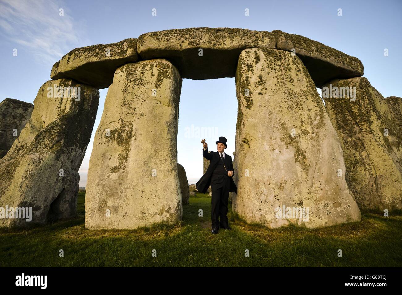 Re-enacting the sale of Stonehenge, originally in Salisbury, one hundred years ago, on 21 September 1915, is Simon Kirk, playing the role of auctioneer Sir Howard Frank, who sold the world's most famous prehistoric monument to local Wiltshire man, Cecil Chubb. for the sum of &Acirc;&pound;6,600. Stock Photo