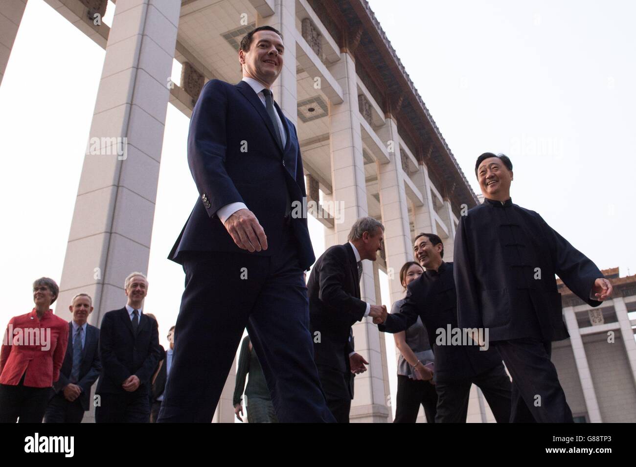Chancellor of the Exchequer George Osborne (front) tours the National Museum in Beijng where he saw artefacts from Chinese history, as Britain must become China's 'best partner in the West', Osborne said as he arrived in Beijing, embarking a week long visit. Stock Photo