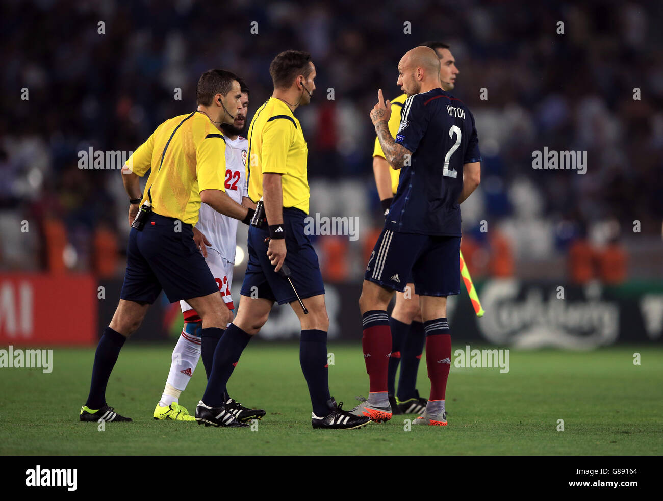 Scotland's Alan Hutton speaks to the officials during the UEFA European Championship Qualifying match at the Boris Paichadze Dinamo Arena, Tbilisi. Picture date: Friday September 4, 2015. See PA story SOCCER Georgia. Photo credit should read: Nick Potts/PA Wire. RESTRICTIONS: Use subject to restrictions. . Commercial use only with prior written consent of the Scottish FA. Call +44 (0)1158 447447 for further information. Stock Photo