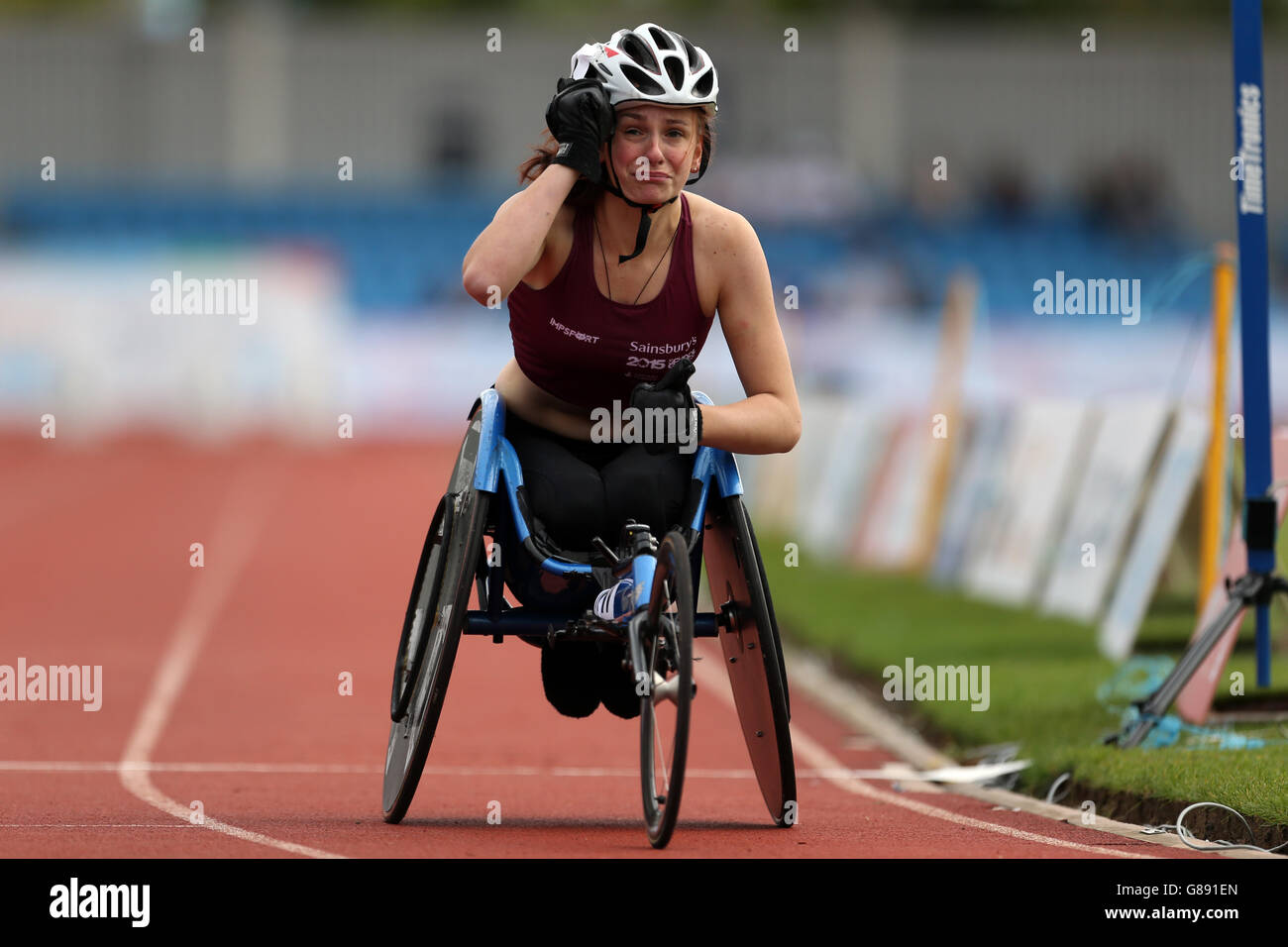England North West's Catherine Scott is overcome with emotion as she crosses the line in the girls 800m wheelchair event at the Sainsbury's 2015 School Games at the Manchester Regional Arena. Stock Photo