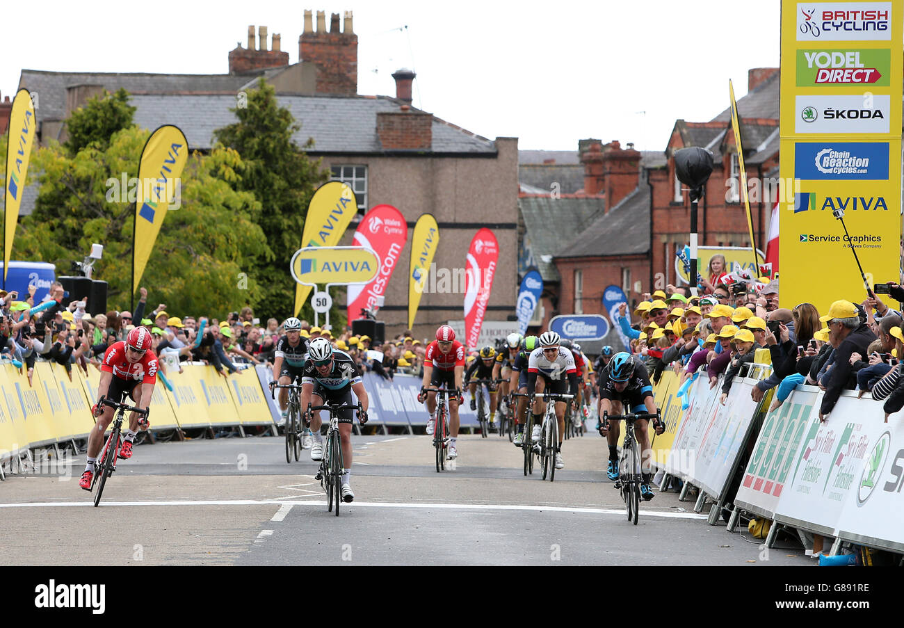 Team Sky's Elia Viviani (right) wins the first stage ahead of Etixx-Quick Step's Mark Cavendish and Lotto-Soudal's Andre Greipel (left) during Stage One of the Tour of Britain from Anglesey to Wrexham. Stock Photo