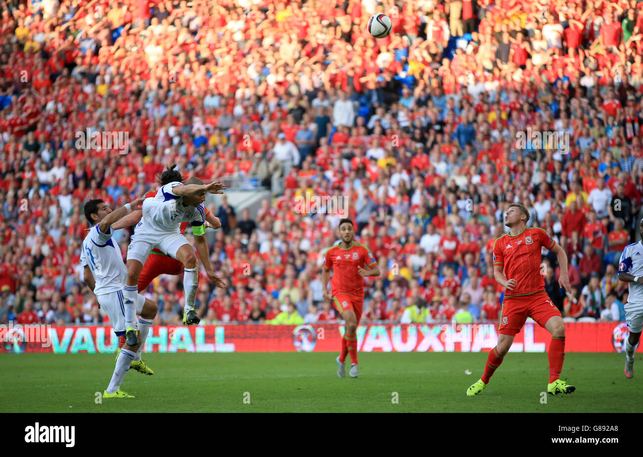 Wales' Gareth Bale (left) gets the flick on for teammate Simon Church (right) to score but the goal is disallowed for offside during the 2016 qualifying match at the Cardiff City Stadium, Cardiff. Stock Photo