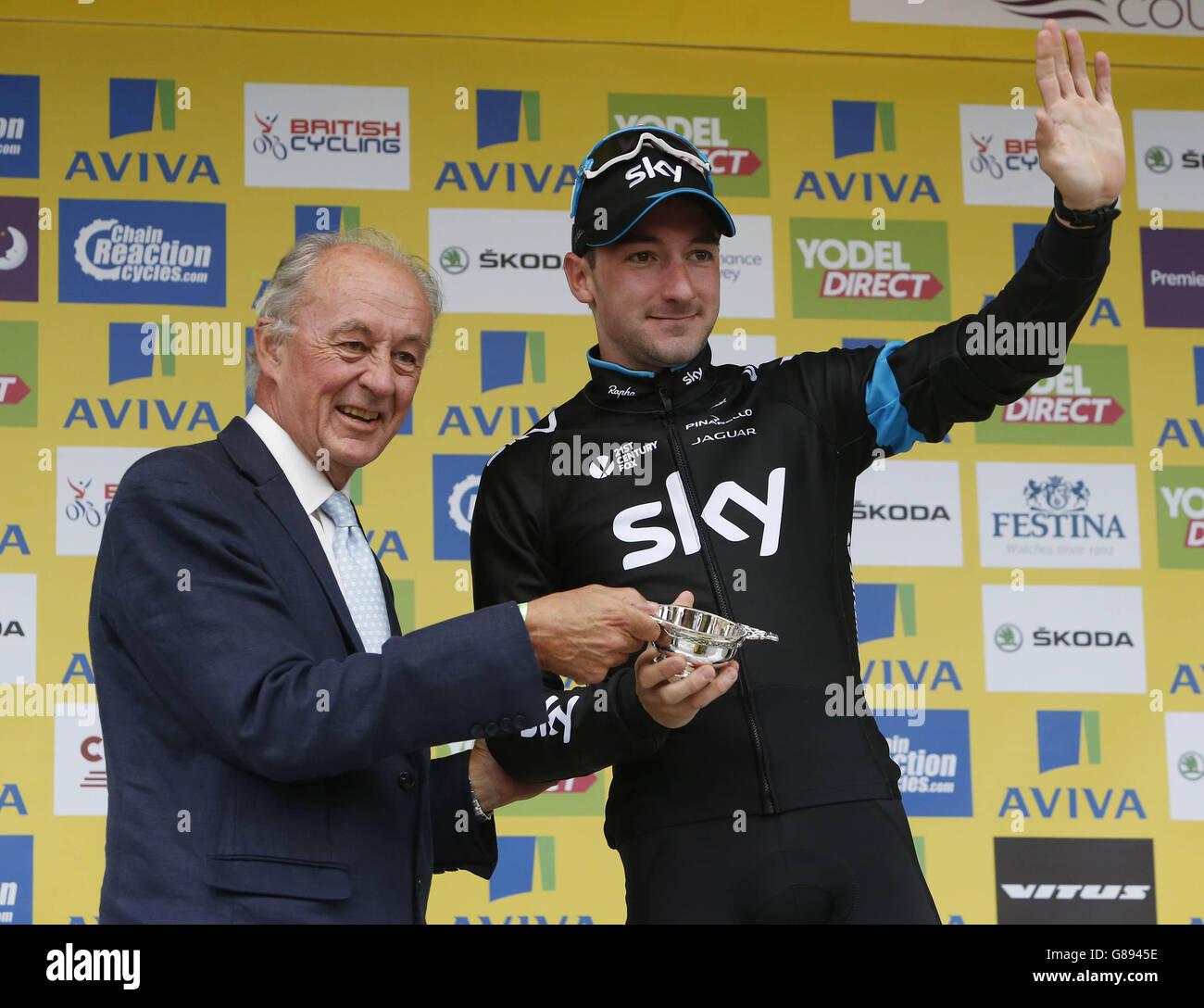 Lord Roxburghe presents a trophy to stage winner Elia Viviani from Team Sky during Stage Three of the Tour of Britain from Cockermouth to Floors Castle. Stock Photo