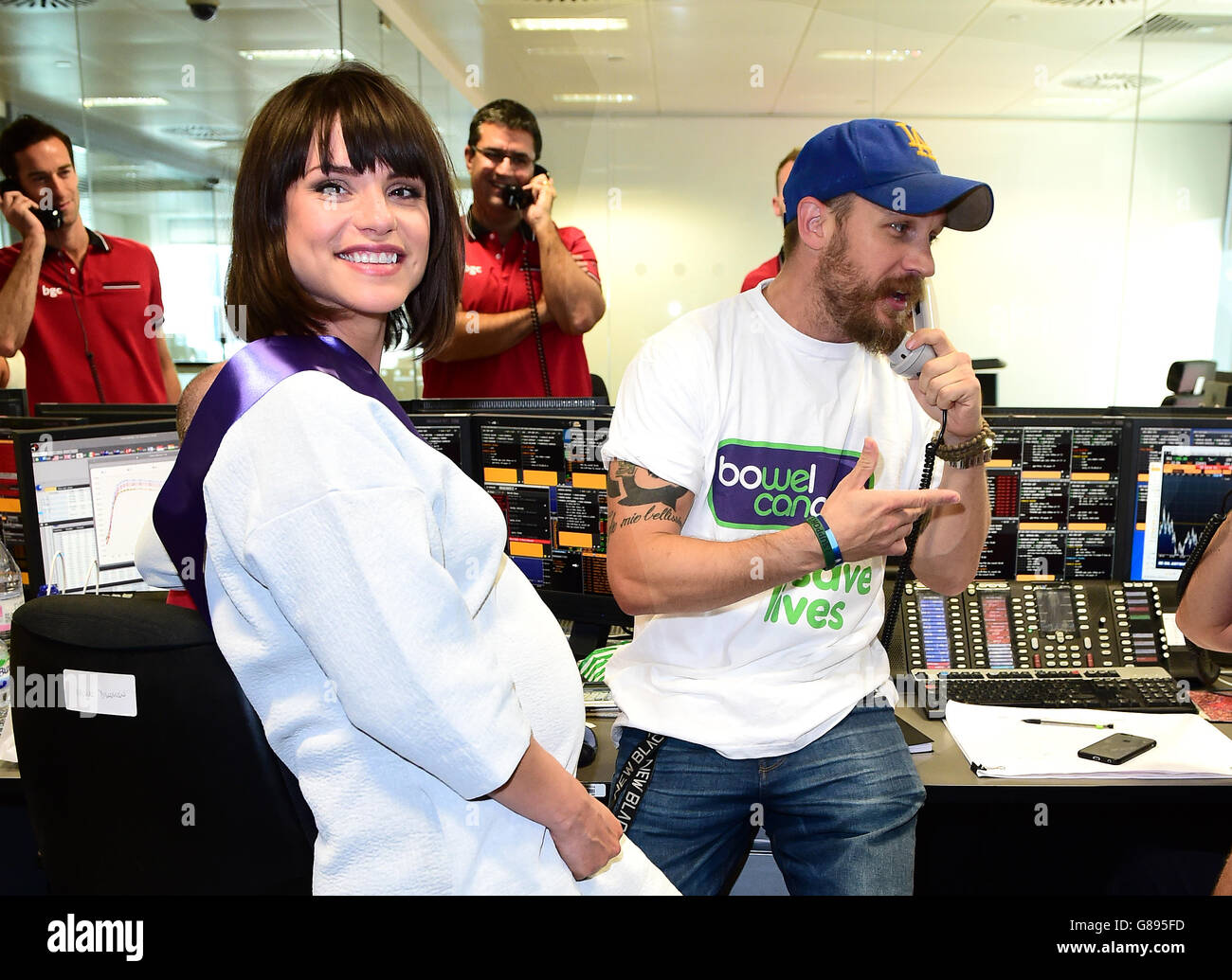 BGC Charity Day - London. Charlotte Riley and Tom Hardy take part in the BGC Annual Global Charity Day at Canary Wharf in London. Stock Photo