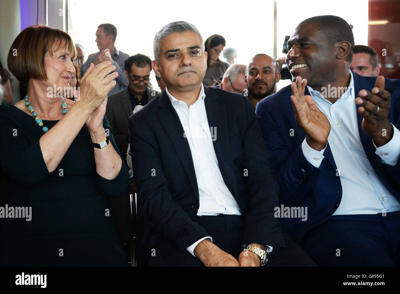 Sadiq Khan MP is congratulated by Tessa Jowell (left), and David Lammy (right) after it was announced that he has been chosen as the Labour candidate to run for London mayor in 2016. Stock Photo