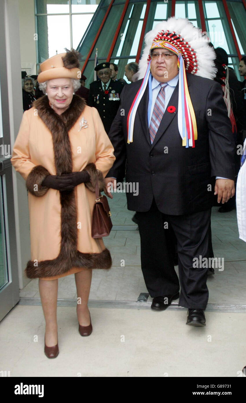 Queen Elizabeth II arrives in Regina, Canada for the start of her state visit to Saskatchewan and Alberta. The Queen visited the First Nations University in Regina, accompanied by Cree Chief, Alphonse Bird (right) of the Federation of Indian Nations. Stock Photo