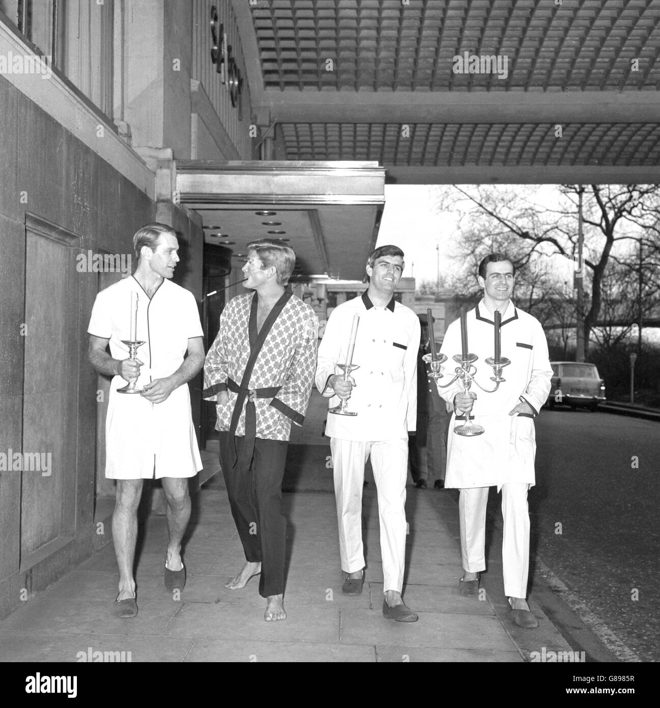 A tailored look is theme for this collection of men's pyjamas designed for Bonsoir by Hardy Amies. (l-r) Greg Herbert in 'Bonsoir', Rod Tailby in 'Good Evening', Malcolm Johns in 'Double or Quits' and El Nagy in 'O'Brady'. Stock Photo