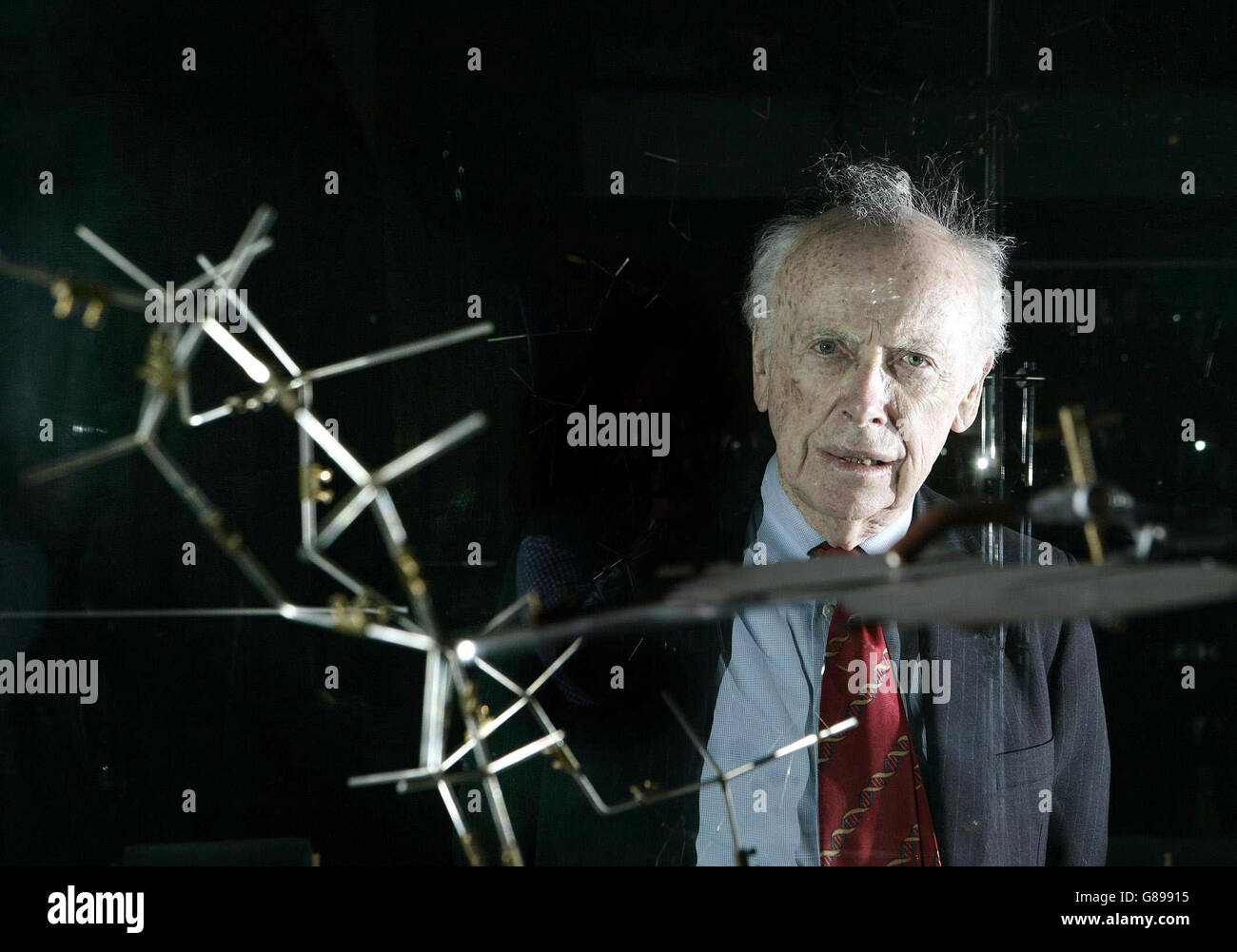 Dr James Watson, who discovered the structure of DNA more than 50 years ago stands next to the