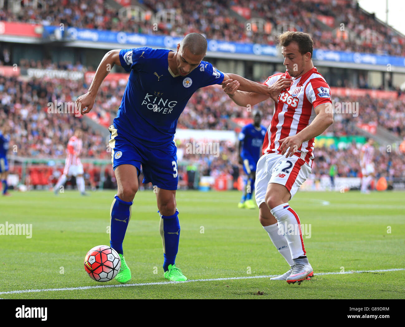 Stoke City S Xherdan Shaqiri Right And Leicester City S Gokhan Inler Battle For The Ball During The Barclays Premier League Match At The Britannia Stadium Stoke On Trent Stock Photo Alamy