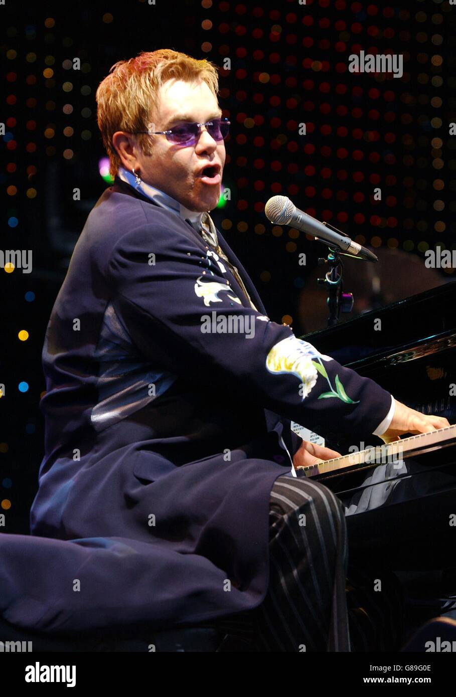 Elton John Concert - Madejski Stadium. Sir Elton John performs on stage. Stock Photo
