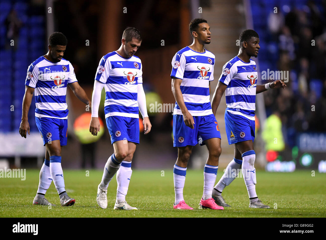 Reading players walk off the pitch dejected after the final whistle during the Capital One Cup